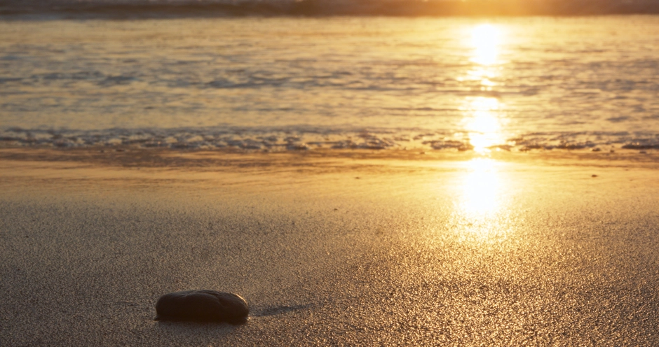 Sunset over the beach and sand