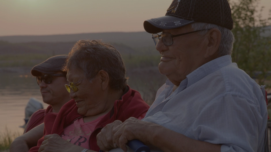 Two elders listen 